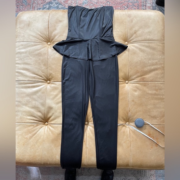 Black almost leather like stretchy peplum jumpsuit small - Picture 2 of 5